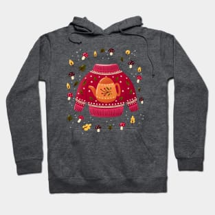 Christmas holiday sweater with tea kettle, leaves and mushrooms. Colorful winter festive illustration. Hoodie